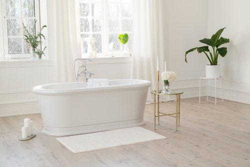 White modern bathroom with silver fittings with large sunny wind Bath Mat